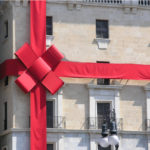 inherited property concept shown as house with wrapped bow